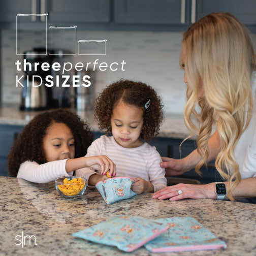 Ellie Snack Bag on light speckled granite countertop in kitchen with warm neutral tones and natural lighting